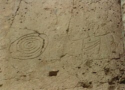 Puye Cliff Dwellings — cliffside rooms carved into volcanic tuff